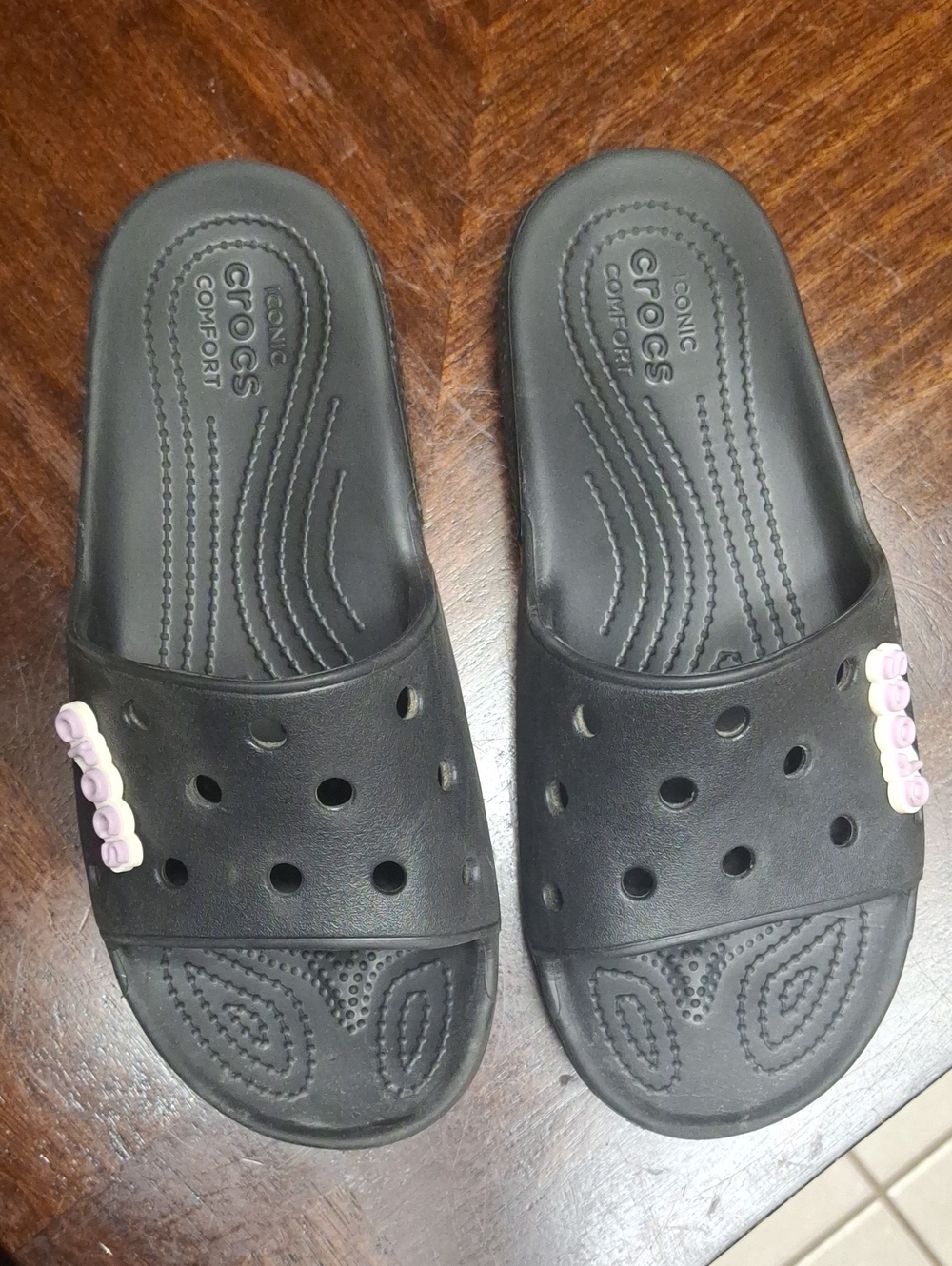 CROCS Black Slide Sandals with Lavender Croc Jibbitz
